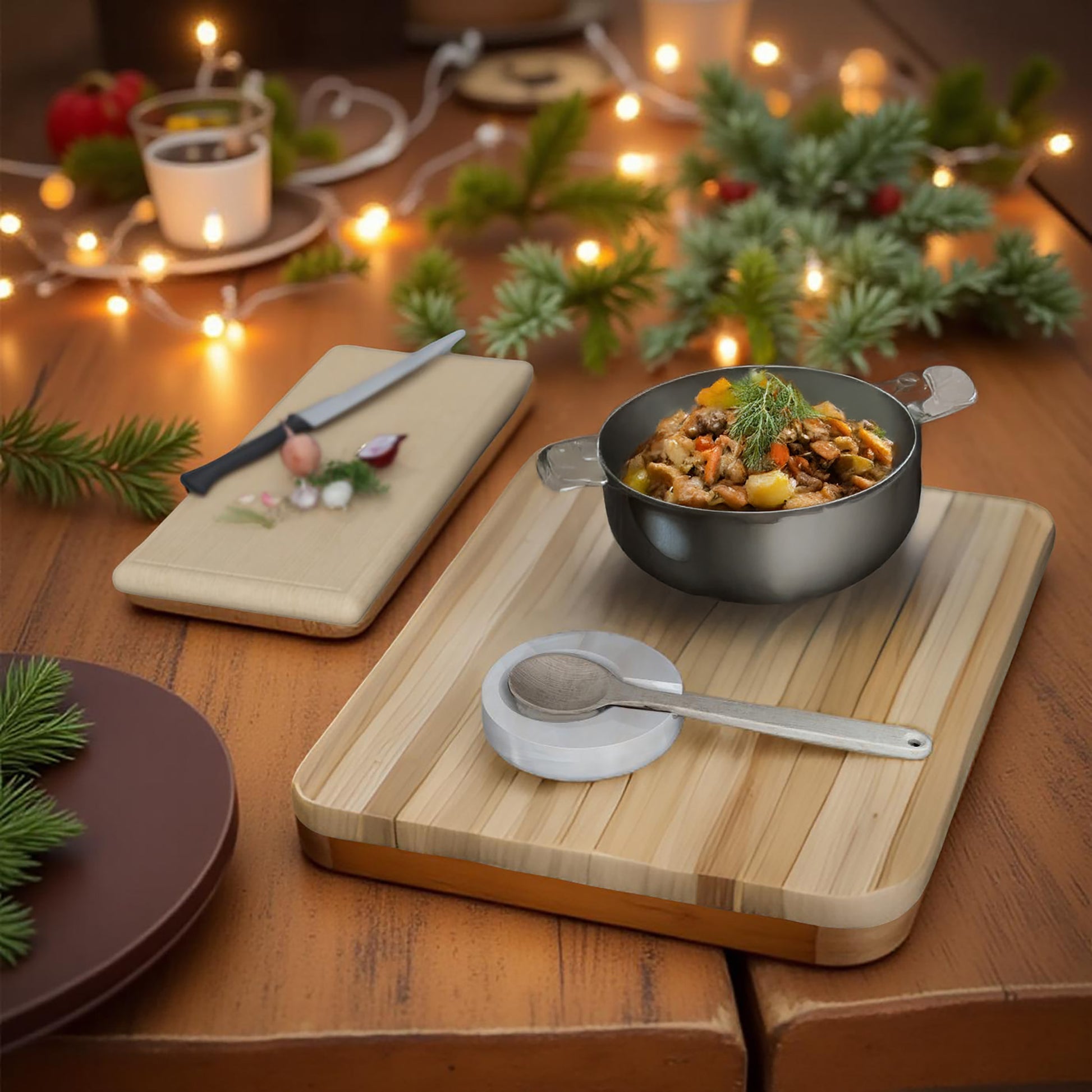 Onyx spoon rest with a holiday-themed table setting and lights